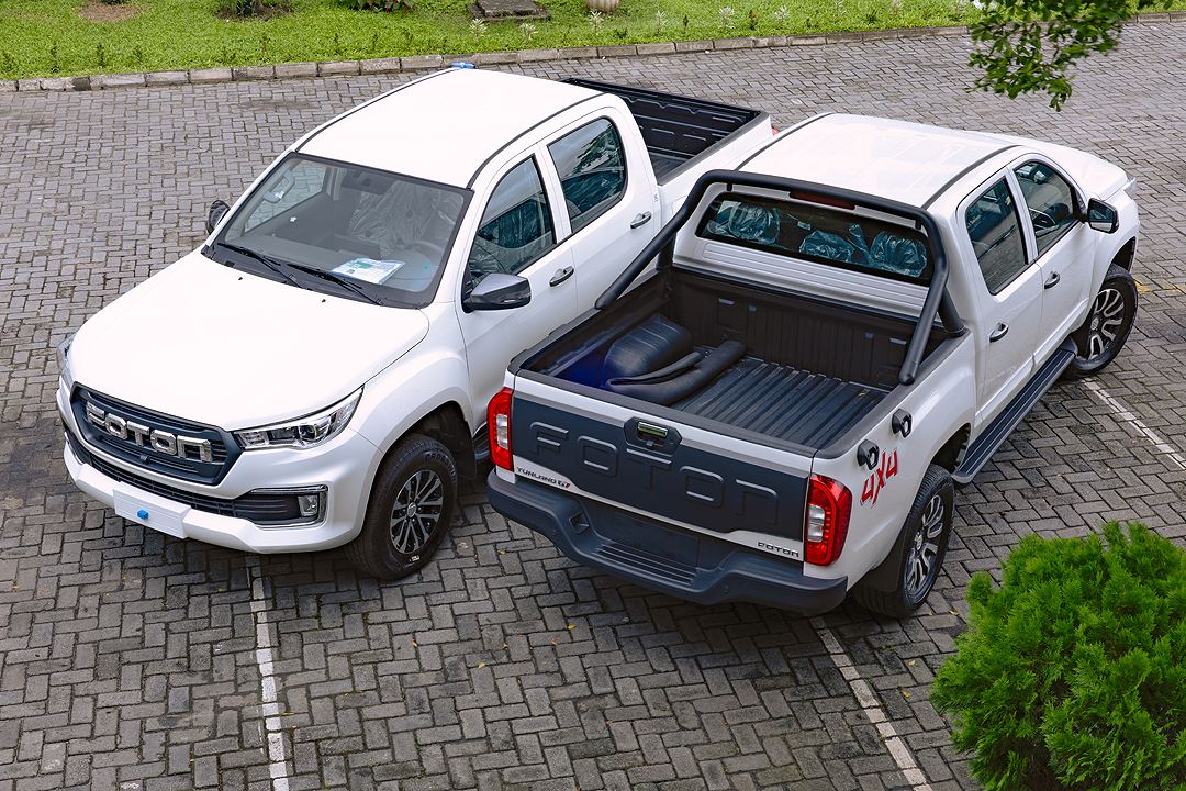 Two white Foton Tunland G7 4x4 double-cab pickups at the Leventis Motors showroom in Apapa, Lagos